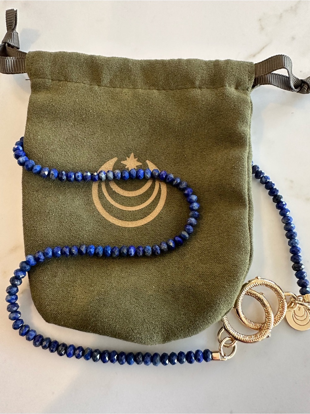 Jane Win blue Lapis Bead Necklace with Gold Ring clasp. Come with dust bag.